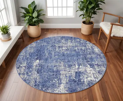 8' Ivory and Blue Abstract Distressed Round Rug