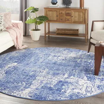 8' Ivory and Blue Abstract Distressed Round Rug