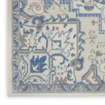 5' X 7' Blue Floral Power Loom Area Rug