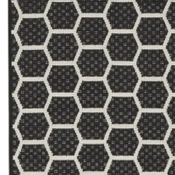 6' Black And Ivory Geometric Indoor Outdoor Area Rug