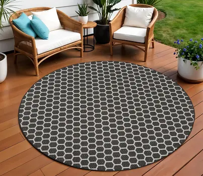 8' Black And Ivory Geometric Indoor Outdoor Area Rug