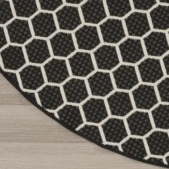 8' Black And Ivory Geometric Indoor Outdoor Area Rug