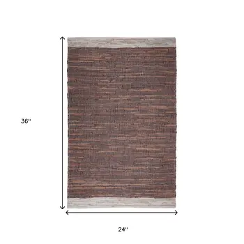 2' X 3' Tan Black and Beige Patchwork Handmade Indoor Outdoor Area Rug