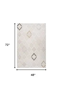 4' X 6' Cream and Beige Geometric Distressed Area Rug