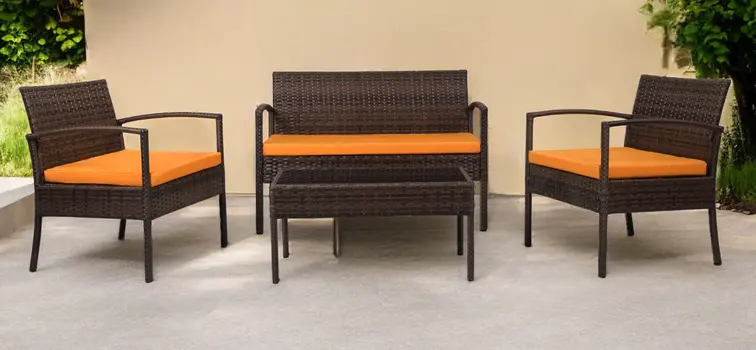 Four Piece Outdoor Dark Brown Wicker Sofa Seating Group with Orange Cushions