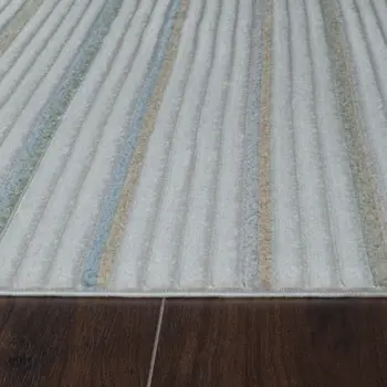 5' X 7' Cream and Beige Striped Distressed Indoor Outdoor Area Rug