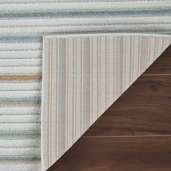 5' X 7' Cream and Beige Striped Distressed Indoor Outdoor Area Rug