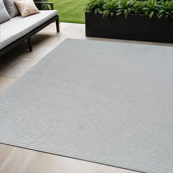 5' X 7' Cream and Beige Striped Distressed Indoor Outdoor Area Rug
