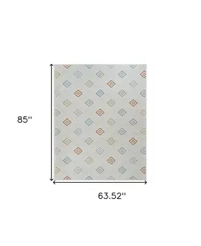 5' X 7' Cream and Beige Geometric Distressed Indoor Outdoor Area Rug