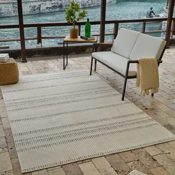 4' X 6' Cream and Beige Striped Distressed Indoor Outdoor Area Rug