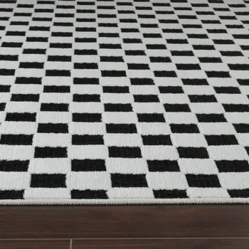 8' Black and White Geometric Distressed Indoor Outdoor Runner Rug