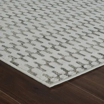 5' X 7' Cream and Beige Geometric Distressed Indoor Outdoor Area Rug