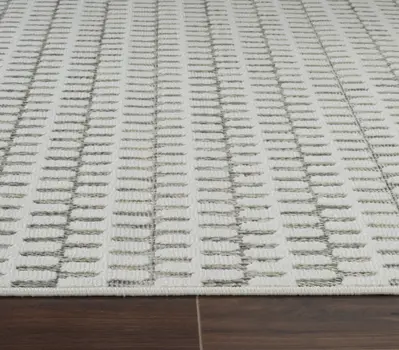 5' X 7' Cream and Beige Geometric Distressed Indoor Outdoor Area Rug