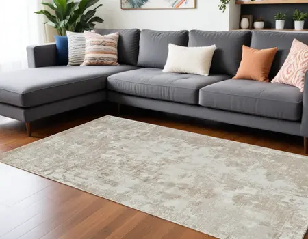 8' X 11' Cream and Beige Abstract Distressed Area Rug