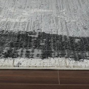 8' X 11' Beige and Black Abstract Distressed Area Rug