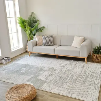 4' X 6' Beige and Green Abstract Distressed Area Rug