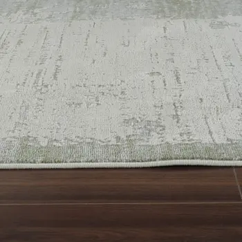 8' X 11' Beige and Green Abstract Distressed Area Rug