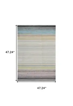 4' X 6' Beige and Blue Abstract Distressed Area Rug