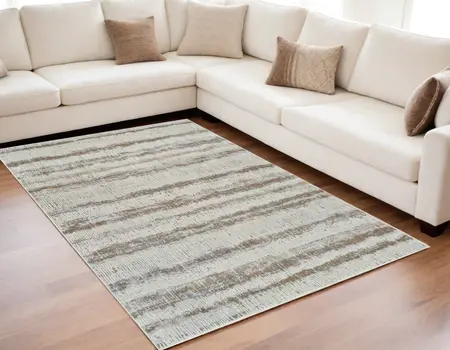 5' X 8' Beige and Brown Abstract Non Skid Area Rug