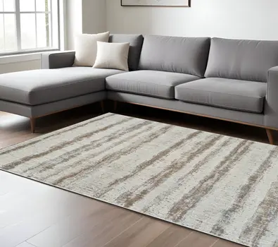 8' X 11' Beige and Brown Abstract Non Skid Area Rug