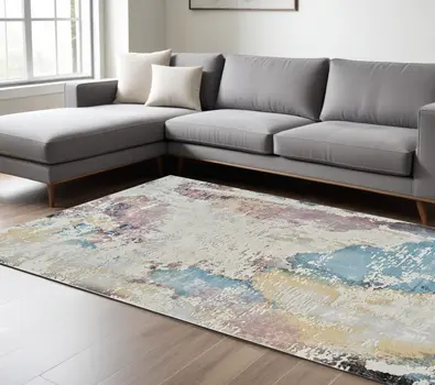 8' X 11' Beige and Blue Abstract Distressed Area Rug