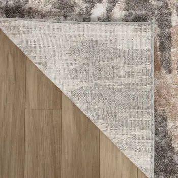5' X 8' Beige and Brown Abstract Distressed Area Rug