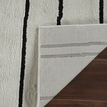 4' X 6' Cream and Black Abstract Distressed Area Rug