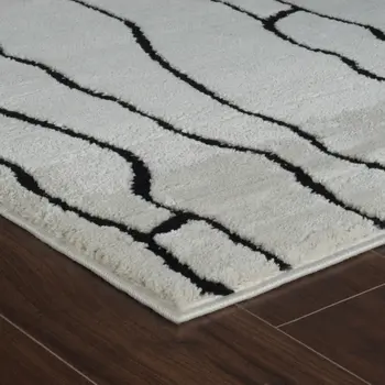 4' X 6' Cream and Black Abstract Distressed Area Rug
