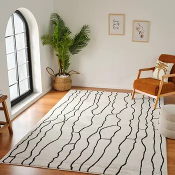 5' X 8' Cream and Black Abstract Distressed Area Rug