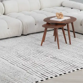 8' X 11' Cream and Black Abstract Distressed Area Rug
