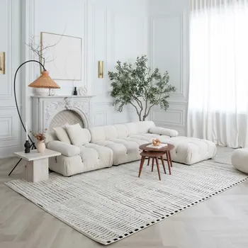 8' X 11' Cream and Black Abstract Distressed Area Rug