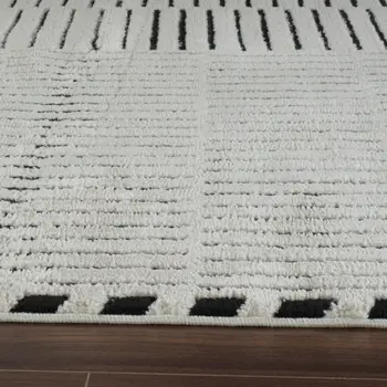8' X 11' Cream and Black Abstract Distressed Area Rug