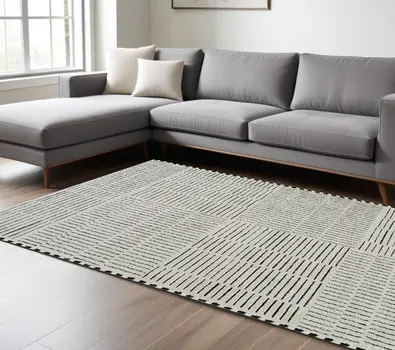 8' X 11' Cream and Black Abstract Distressed Area Rug