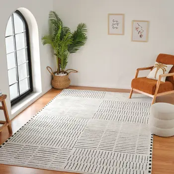 8' X 11' Cream and Black Abstract Distressed Area Rug