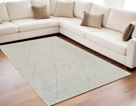 5' X 8' Cream and Beige Abstract Non Skid Area Rug