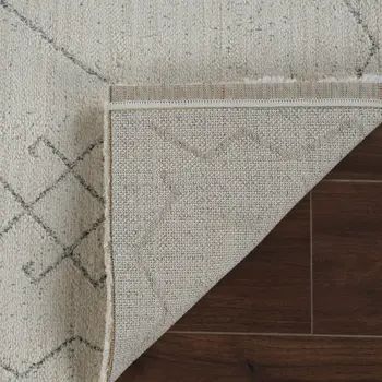 7' X 10' Cream and Beige Abstract Non Skid Area Rug