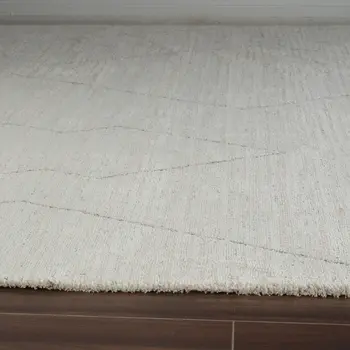 8' X 11' Cream and Beige Abstract Distressed Area Rug