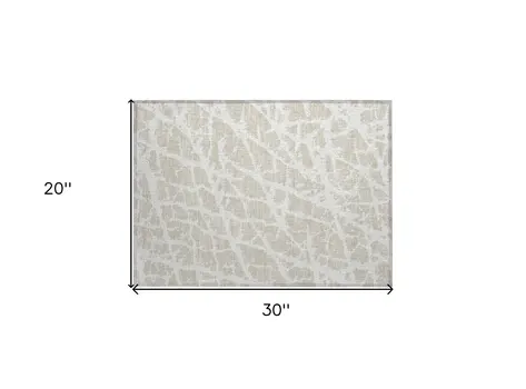 2' X 3' Beige and Ivory Abstract Washable Non Skid Indoor Outdoor Area Rug