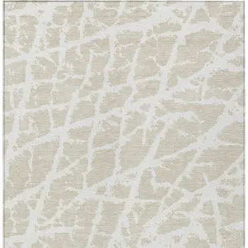 3' X 5' Beige and Ivory Abstract Washable Non Skid Indoor Outdoor Area Rug