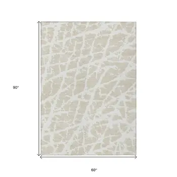 5' X 8' Beige and Ivory Abstract Washable Non Skid Indoor Outdoor Area Rug
