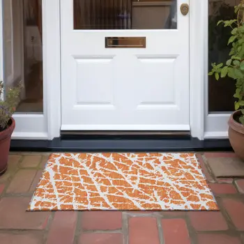 2' X 3' Orange and White Abstract Washable Non Skid Indoor Outdoor Area Rug
