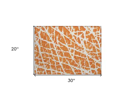 2' X 3' Orange and White Abstract Washable Non Skid Indoor Outdoor Area Rug