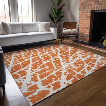 5' X 8' Orange and White Abstract Washable Non Skid Indoor Outdoor Area Rug