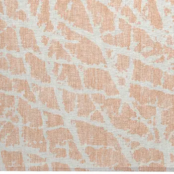 2' X 3' Peach and Ivory Abstract Washable Non Skid Indoor Outdoor Area Rug