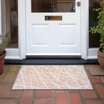2' X 3' Peach and Ivory Abstract Washable Non Skid Indoor Outdoor Area Rug