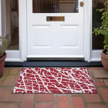 2' X 3' Red and White Abstract Washable Non Skid Indoor Outdoor Area Rug