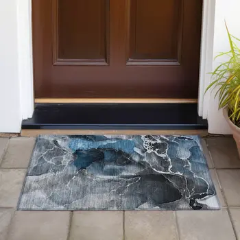 2' X 3' Ivory Blue and Gray Abstract Washable Non Skid Indoor Outdoor Area Rug