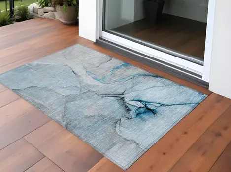 3' X 5' Blue and Ivory Abstract Washable Non Skid Indoor Outdoor Area Rug