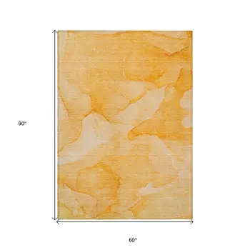 5' X 8' Orange Abstract Washable Non Skid Indoor Outdoor Area Rug