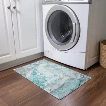 2' X 3' Gray and Ivory Abstract Washable Non Skid Indoor Outdoor Area Rug